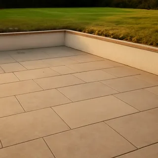 New limestone patio with channel drain at a Florida coastal home